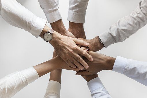 people hands all together